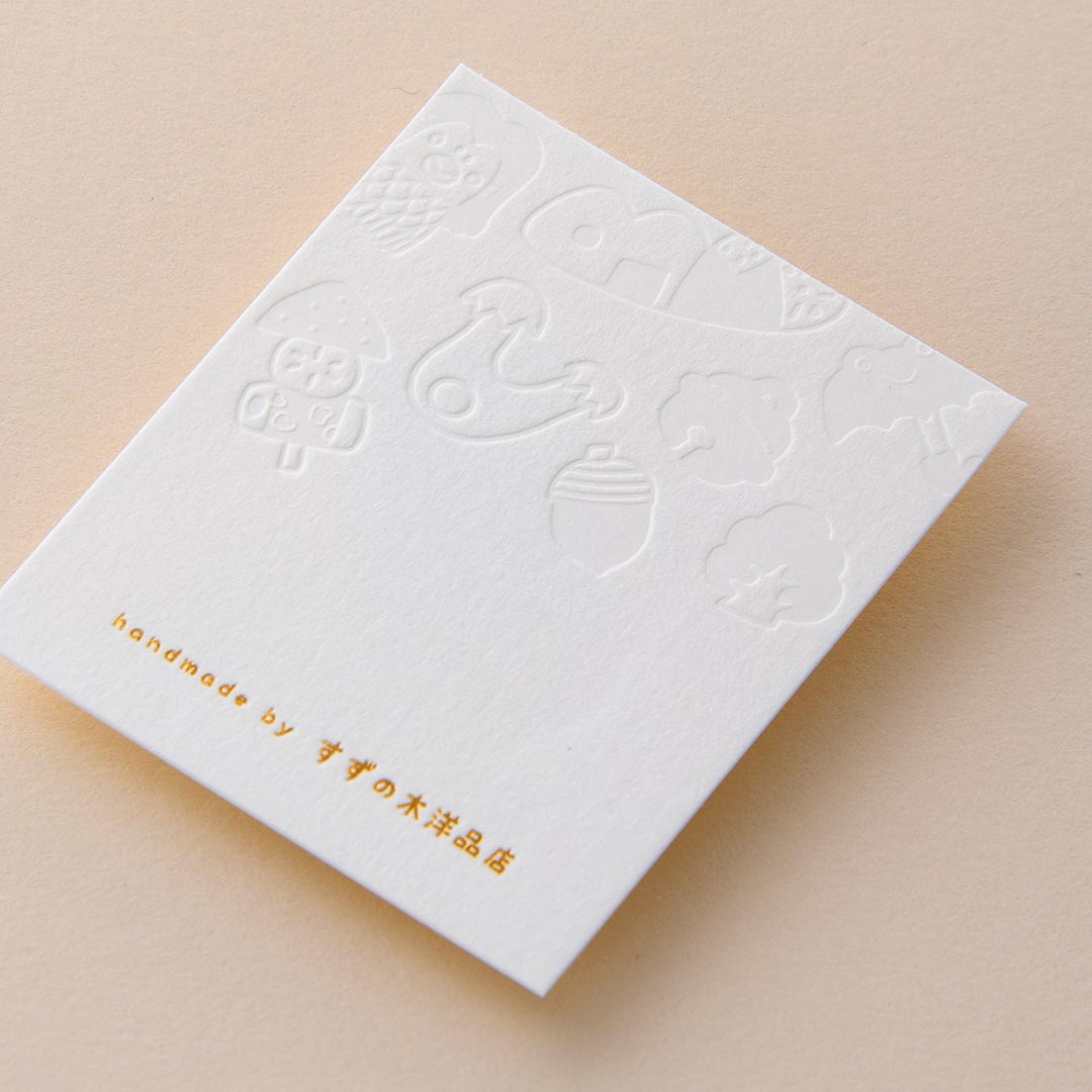 紙│クッション ホワイト<br>箔│つや消し濃赤金箔102+空押し