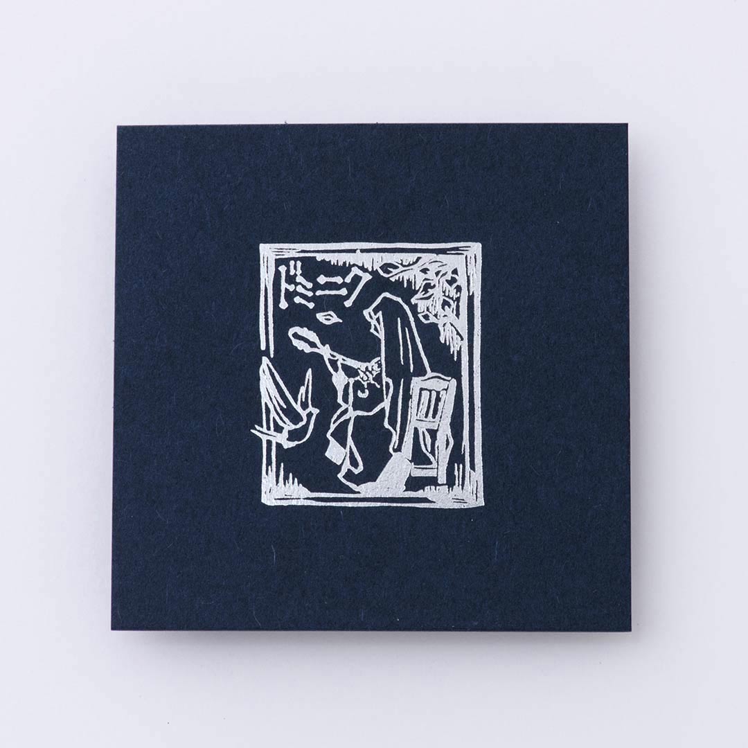 インディゴの特殊紙×銀箔で作成したショップカードデザイン